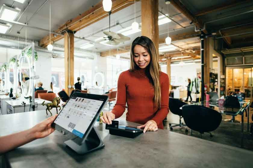 Retail checkout with a tablet point of sale and card reader