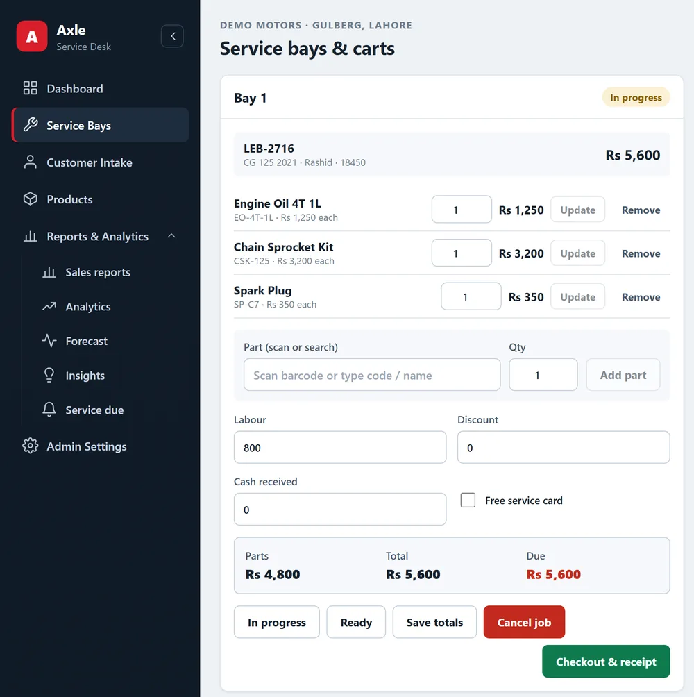 Axle screenshot with demo data. Service bays: a job card for every bike, with parts, labour and checkout